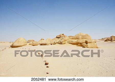 Stock Image - Visitor's Path In Wadi Al-Hitan (Whale Valley), El Fayoum, Egypt. Fotosearch