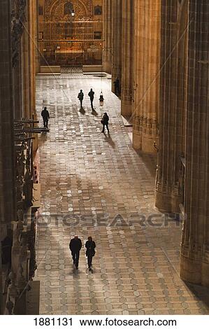 Stock Image - Visitors Strolling In An Aisle Of The New Cathedral (Catedral Nueva); Salamanca, Salamanca Province, Spain. Fotosearch