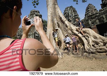 Stock Photo - Visitors Taking Pictures At Prasat Ta Som, Temples Of Angkor, Siem Reap, Cambodia. Fotosearch