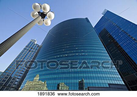 Stock Photograph - Wacker Drive Building With Street Lamp In Foreground, Low Angle View. Fotosearch