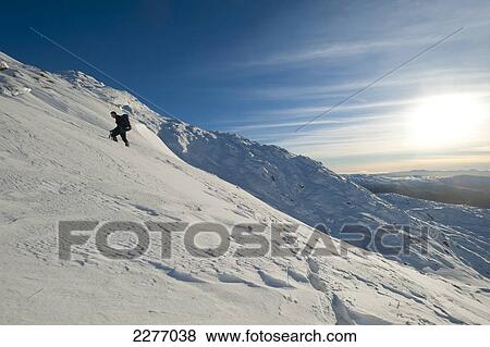 Walker going through heavy snow up Beinn Respiol, Ardnamurchan peninsula, Highlands, Scotland View Large Photo Image Stock Photo - Walker going through heavy snow up Beinn Respiol, Ardnamurchan peninsula, Highlands, Scotland. Fotosearch