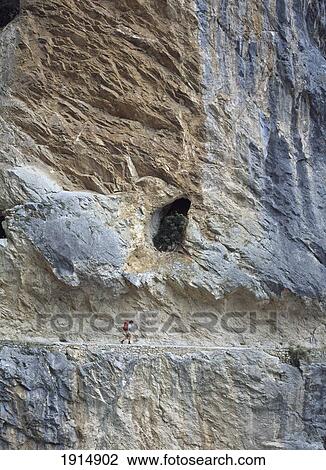 Walker In A Cutting In Face Of Cliff View Large Photo Image Stock Image - Walker In A Cutting In Face Of Cliff. Fotosearch