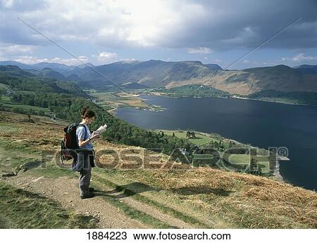 Walker Reading Map And Looking Past Derwent Water And Up Borrow Dale As Seen From Blueberry Fell View Large Photo Image Stock Image - Walker Reading Map And Looking Past Derwent Water And Up Borrow Dale As Seen From Blueberry Fell. Fotosearch