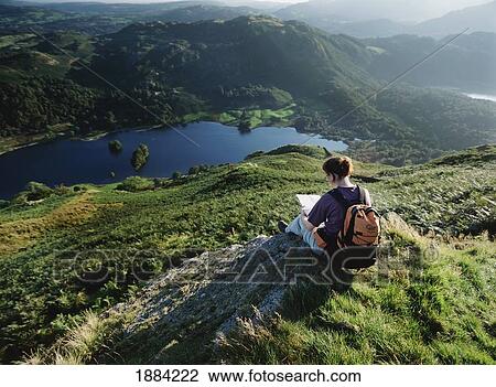 Walker Resting And Looking At Map Above Rydal Water View Large Photo Image Stock Image - Walker Resting And Looking At Map Above Rydal Water. Fotosearch