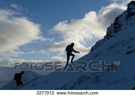 Walkers climbing the snowy slopes of Sgorr Dhearg near Glen Coe; Highlands, Scotland View Large Photo Image Stock Image - Walkers climbing the snowy slopes of Sgorr Dhearg near Glen Coe; Highlands, Scotland. Fotosearch