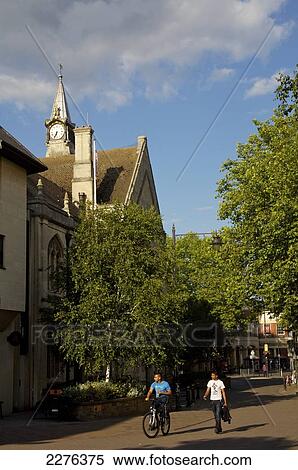 Stock Photography - Walking and cycling on the street; Banbury, Oxfordshire, England. Fotosearch
