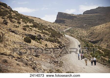 Stock Image - Walking group, near Chennak, Simien Mountains National Park; Amhara region, Ethiopia. Fotosearch
