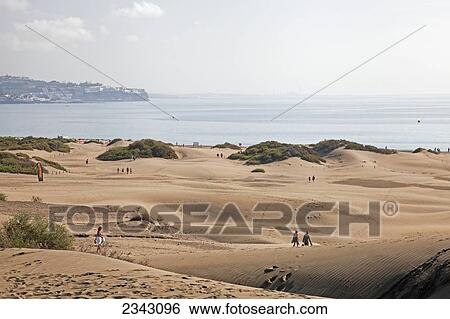 Walking On The Sand Dunes; Maspalona, Gran Canaria, Spain View Large Photo Image Stock Photograph - Walking On The Sand Dunes; Maspalona, Gran Canaria, Spain. Fotosearch