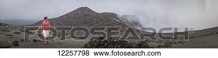 Stock Photo - Walking on top of Yasur Volcano; Tanna Island, Vanuatu. Fotosearch