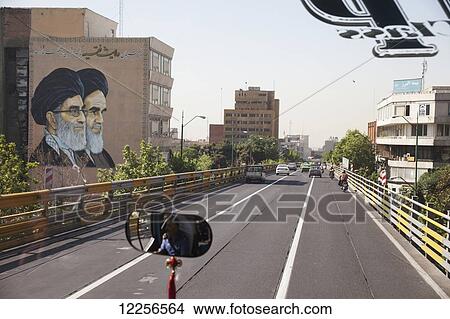 Wall portraits of Supreme Leader Ayatollah Ali Khamenei and Ayatollah Khomeini, beside expressway, Central Tehran; Tehran, Iran View Large Photo Image Picture - Wall portraits of Supreme Leader Ayatollah Ali Khamenei and Ayatollah Khomeini, beside expressway, Central Tehran; Tehran, Iran. Fotosearch