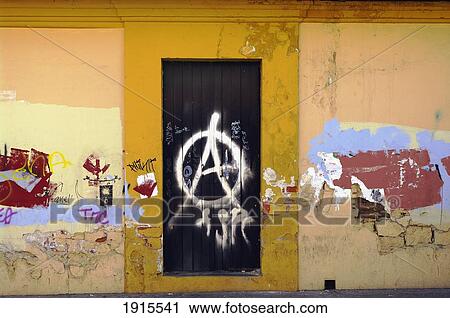 Stock Image - Wall With Closed Door And Graffiti. Fotosearch