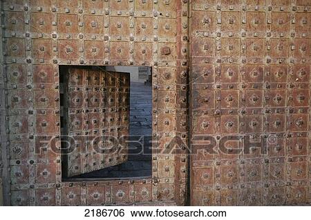 Stock Photograph - Walls and small open doorway, Meherangarh Fort; Jodhpur, Rajasthan, India. Fotosearch