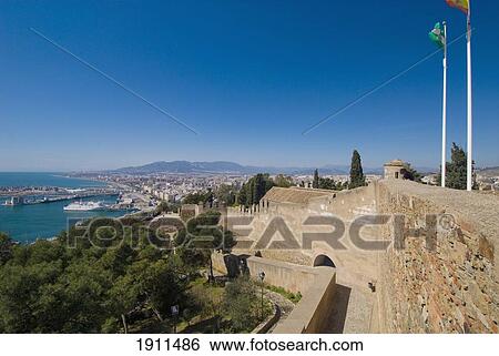 Walls Of Castillo De Gibralfaro With Cityscape In Background, Malaga, Andalucia, Spain View Large Photo Image Stock Photograph - Walls Of Castillo De Gibralfaro With Cityscape In Background, Malaga, Andalucia, Spain. Fotosearch