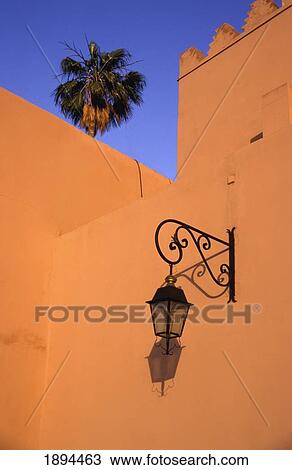 Stock Image - Walls Of Koutoubia Mosque With Street Lamp. Fotosearch