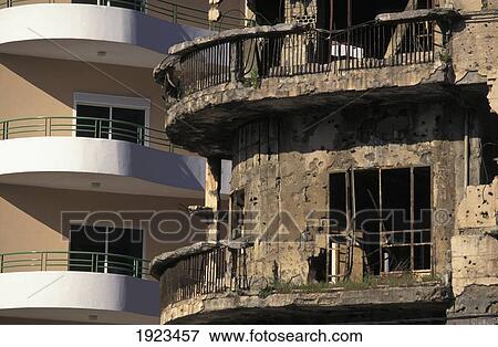 Stock Photo - War Damaged Building & New Development, The Green. Fotosearch