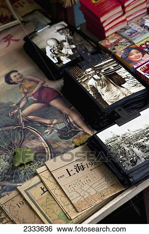 Stock Photograph - Wares On Display In An Antique Street Showing Shanghai's Glory Days; Shanghai, China. Fotosearch
