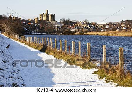 Warkworth, Northumberland, England; A Snow Covered Path Along The Water View Large Photo Image Picture - Warkworth, Northumberland, England; A Snow Covered Path Along The Water. Fotosearch
