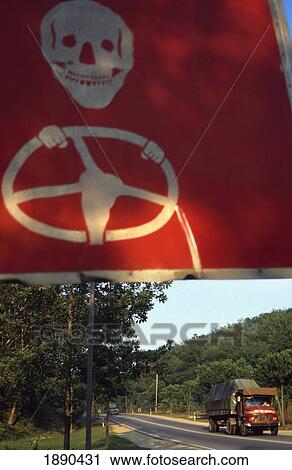 Stock Image - Warning Sign On Roadside. Fotosearch