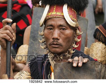 Stock Image - Warrior During Hornbill Festival, Portrait; Nagaland, India. Fotosearch