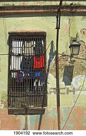 Washing Drying In Window With Grating, Santiago De Cuba, Cuba View Large Photo Image Stock Image - Washing Drying In Window With Grating, Santiago De Cuba, Cuba. Fotosearch