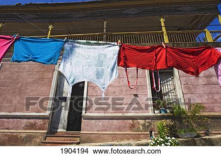 Washing Drying On Clothes Line Outside House, Cayo Granma, Santiago Bay, Cuba View Large Photo Image Picture - Washing Drying On Clothes Line Outside House, Cayo Granma, Santiago Bay, Cuba. Fotosearch