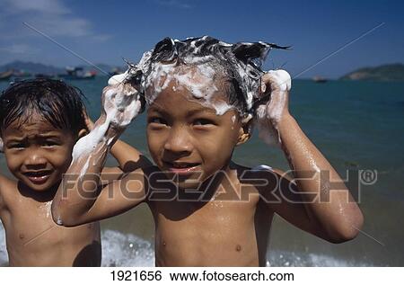 Washing Hair In The Sea Near Nha Trang View Large Photo Image Stock Photograph - Washing Hair In The Sea Near Nha Trang. Fotosearch