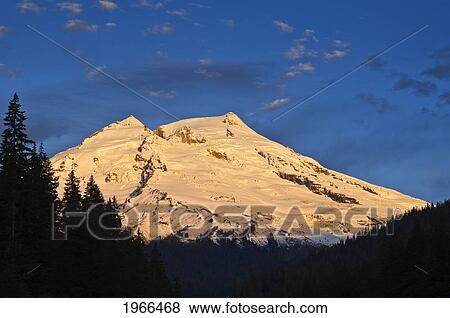 Washington, Sunrise On Mount Baker, View From Boulder Creek At Baker Lake. View Large Photo Image Stock Photo - Washington, Sunrise On Mount Baker, View From Boulder Creek At Baker Lake.. Fotosearch