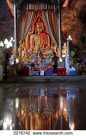 Stock Image - Wat Ban Tham, or The Dragon Temple; Kanchanaburi, Thailand. Fotosearch