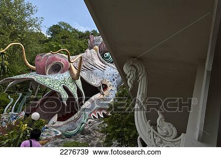 Stock Photo - Wat Ban Tham, or The Dragon Temple; Kanchanaburi, Thailand. Fotosearch