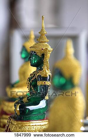 Stock Photo - Wat Somdej Phuttachan, Thailand; Close-Up Of Small Buddhist Statues. Fotosearch
