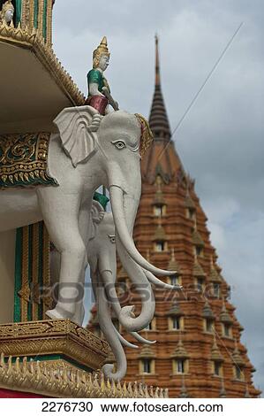 Stock Image - Wat Tham Seu, or Big Buddha Temple; Kanchanaburi, Thailand. Fotosearch