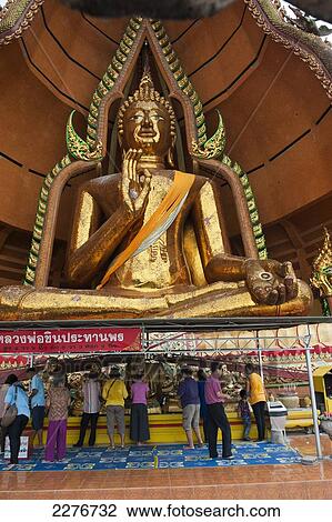 Stock Image - Wat Tham Seu, or Big Buddha Temple; Kanchanaburi, Thailand. Fotosearch
