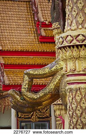 Stock Photo - Wat Tham Seu, or Big Buddha Temple; Kanchanaburi, Thailand. Fotosearch