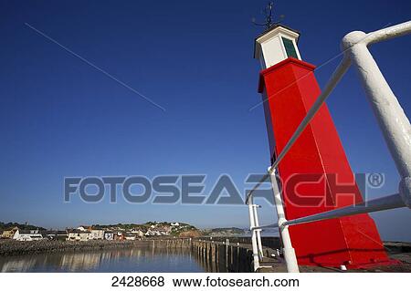 Stock Photo - Watchet Harbour and lighthouse; Somerset, England. Fotosearch