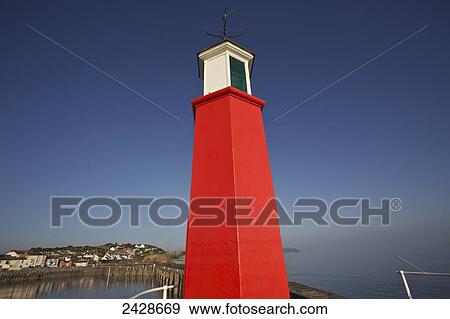 Stock Photo - Watchet Harbour and lighthouse; Somerset, England. Fotosearch