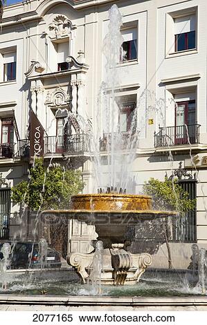 Stock Photography - Water Fountain Splashing Outside A Buidling; Jerez De La Frontera Andalusia Spain. Fotosearch