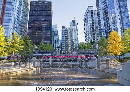 Stock Image - Water Park And Residential Skyscrapers In Coal Harbor, Vancouver, British Columbia, Canada. Fotosearch