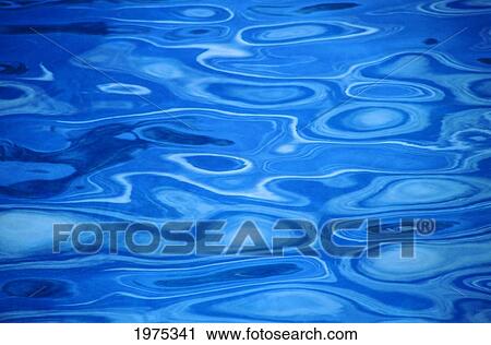 Stock Image - Water Surface, Ripples In Vivid Blue.. Fotosearch