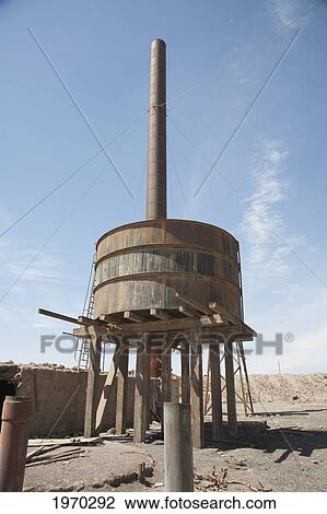 Stock Image - Water Tank And Chimney At The Office Chacabuco, Chile, Antofagasta. Fotosearch