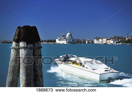 Stock Image - Water Taxi And St Marks As Seen From Riva San Biagio. Fotosearch