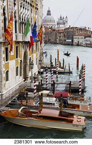 Stock Image - Water taxis on the Grand Canal; Venice, Italy. Fotosearch
