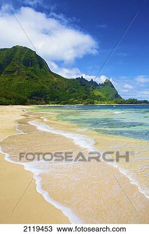 Water washing up onto the sand along the coast; Wailua, Hawaii, United States of America View Large Photo Image Stock Image - Water washing up onto the sand along the coast; Wailua, Hawaii, United States of America. Fotosearch