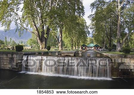 Stock Image - Waterfall In A Park; Srinagar, India. Fotosearch