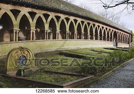 Stock Photography - Watts Chapel and cemetery; Compton, Surrey, England. Fotosearch