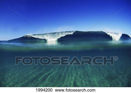 Wave Breaking In Distance, Glassy Turqouise Water In Foreground View Large Photo Image Stock Image - Wave Breaking In Distance, Glassy Turqouise Water In Foreground. Fotosearch