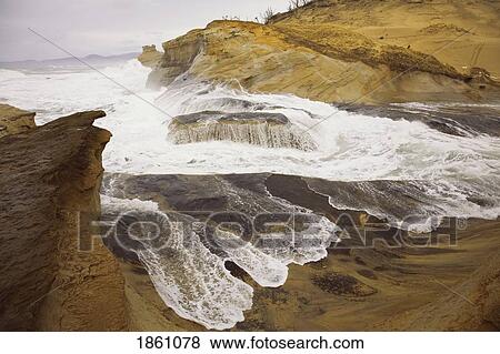 Stock Photo - Wave Crashing On Shore; Oregon Coast, Oregon, Usa. Fotosearch