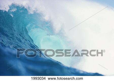 Picture - Wave Curling Over With Whitewash And A Barrel Forming. Fotosearch