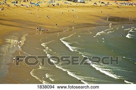 Picture - Waves Breaking On Beach In Scarborough; Scarborough, Yorkshire, England, Uk. Fotosearch