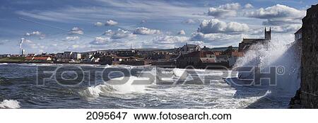 Waves Crashing Against A Wall On The Shore; Dunbar Scottish Borders Scotland View Large Photo Image Stock Photo - Waves Crashing Against A Wall On The Shore; Dunbar Scottish Borders Scotland. Fotosearch