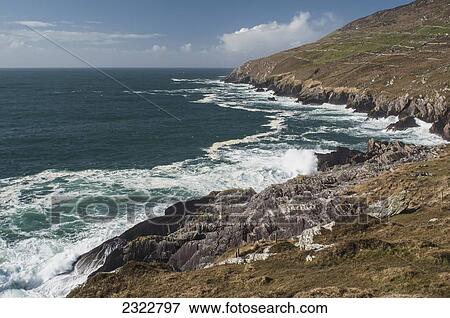 Waves crashing against Bolus Head; Ballinskelligs, Ring of Skelligs, County Kerry, Ireland, UK View Large Photo Image Stock Photo - Waves crashing against Bolus Head; Ballinskelligs, Ring of Skelligs, County Kerry, Ireland, UK. Fotosearch